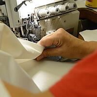 Coser tela